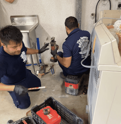 The Sewer Brothers plumbing team at work