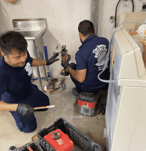 The Sewer Brothers plumbing team at work